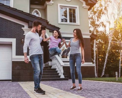 Happy family in front yard